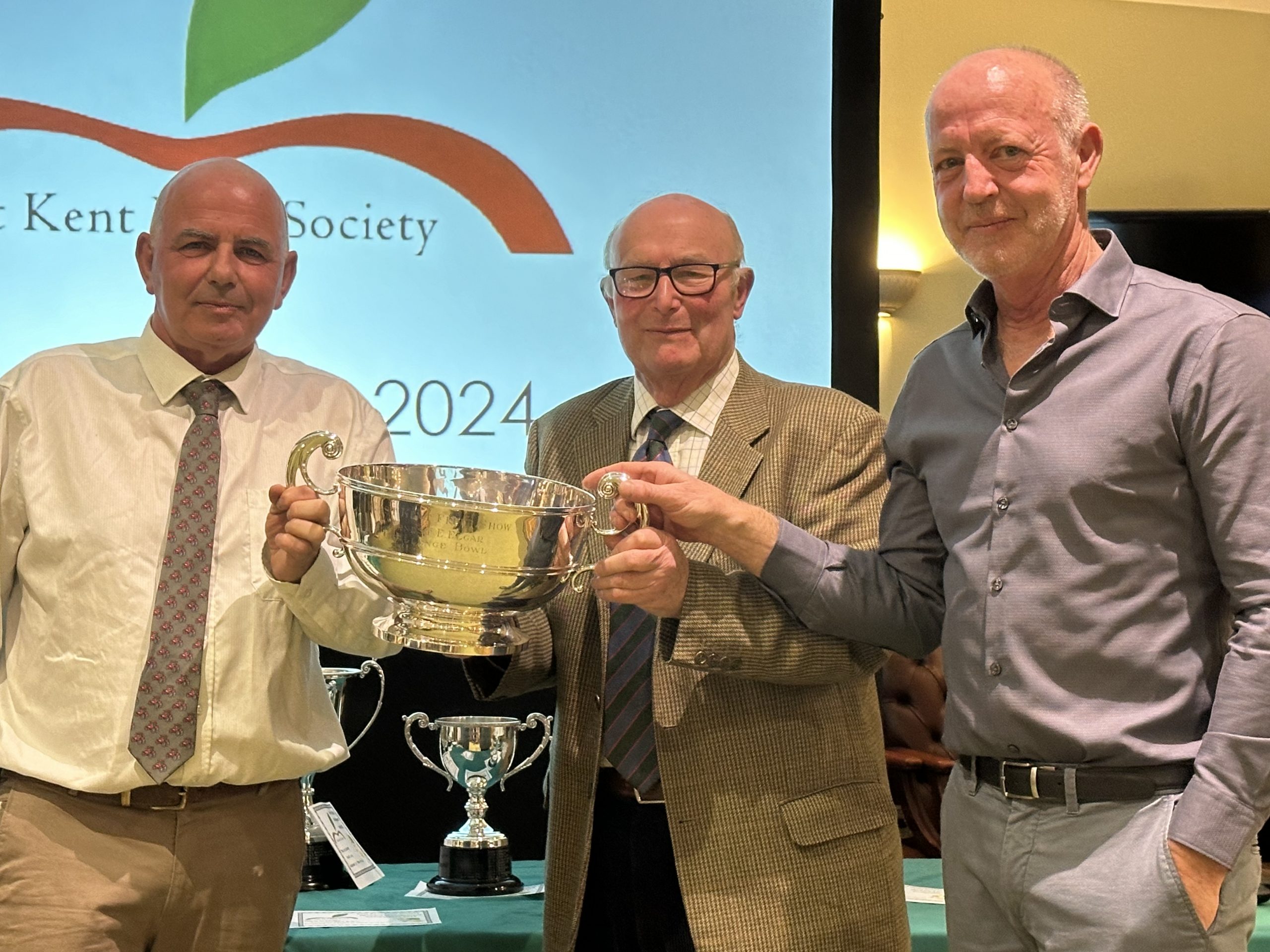 William & David Riccini receiving the cup from Henry Bryant